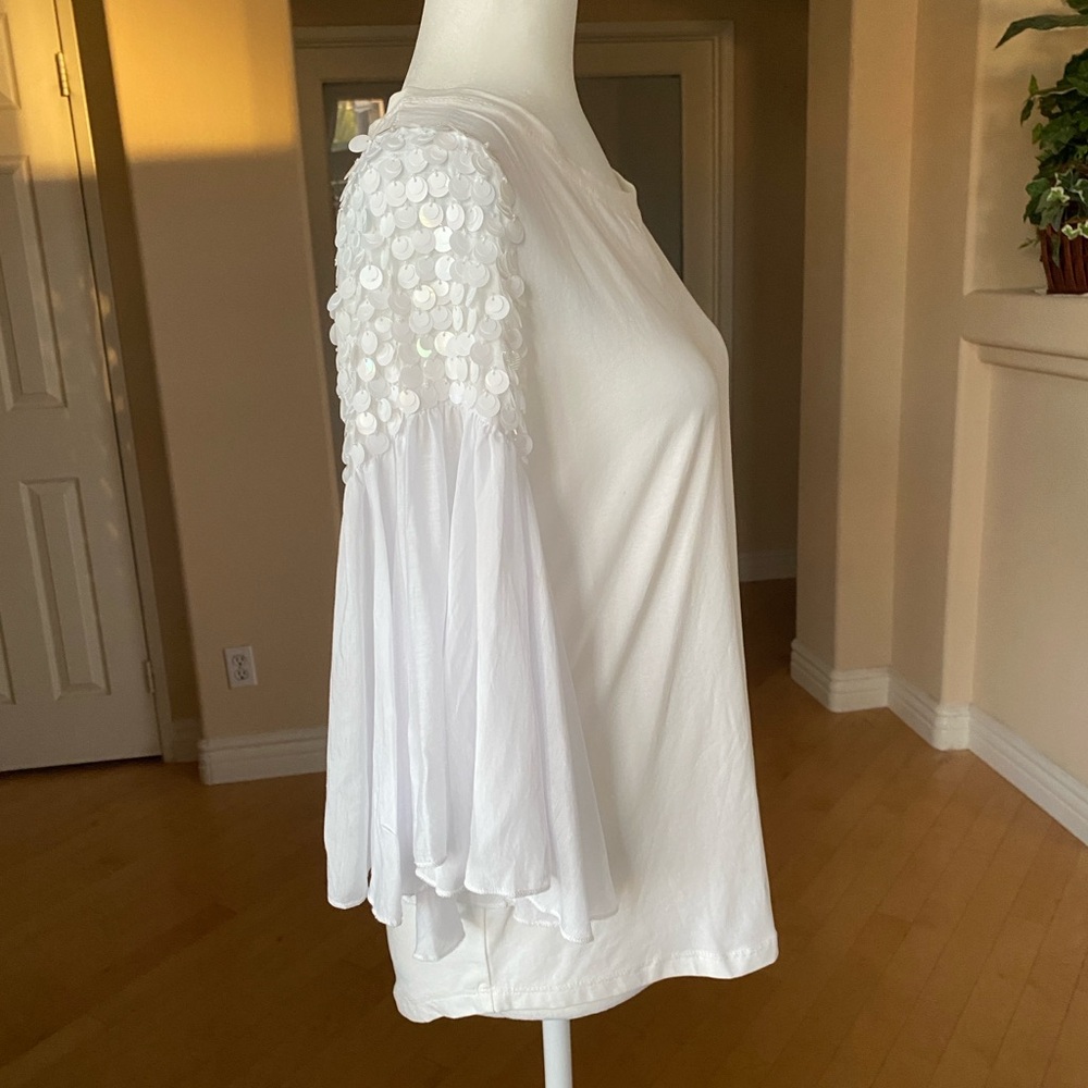 White Ruffled Bell Sleeve Blouse Embellished Shoulder Design